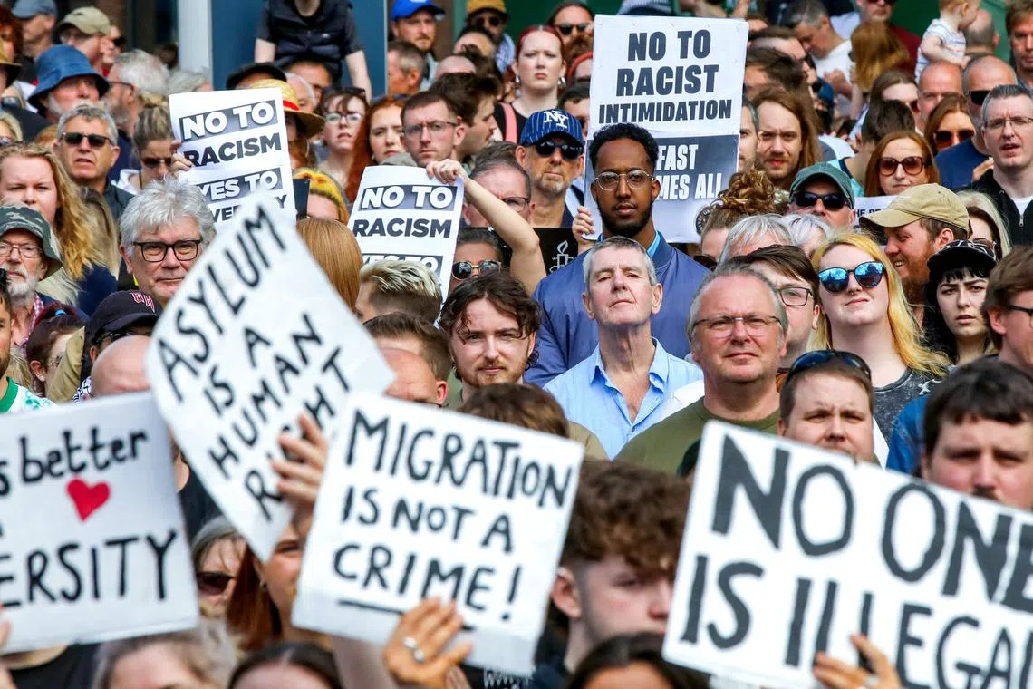 Thousands of people gather at a Anti Racism rally in Belfast city centre on Aug 10, following a week of disorder across the province. 