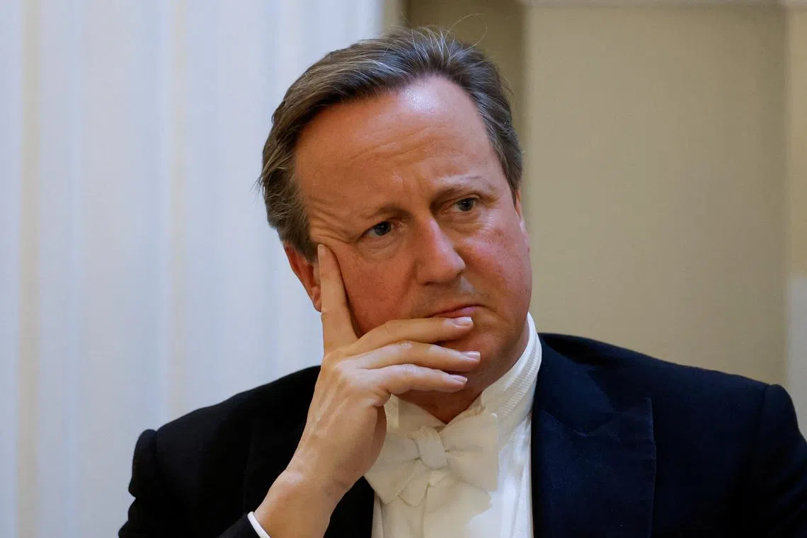FILE PHOTO: Britain's Foreign Secretary David Cameron listens to the speech of the Lord Mayor of the City of London Michael Mainelli during the annual Lord Mayor's Easter Banquet at Mansion House in London, Britain, May 9, 2024. REUTERS/Peter Cziborra/File Photo
