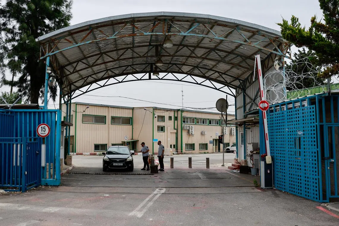 FILE PHOTO: Security personnel work at the UNRWA headquarters, in Jerusalem, May 10, 2024. REUTERS/Ammar Awad/File Photo