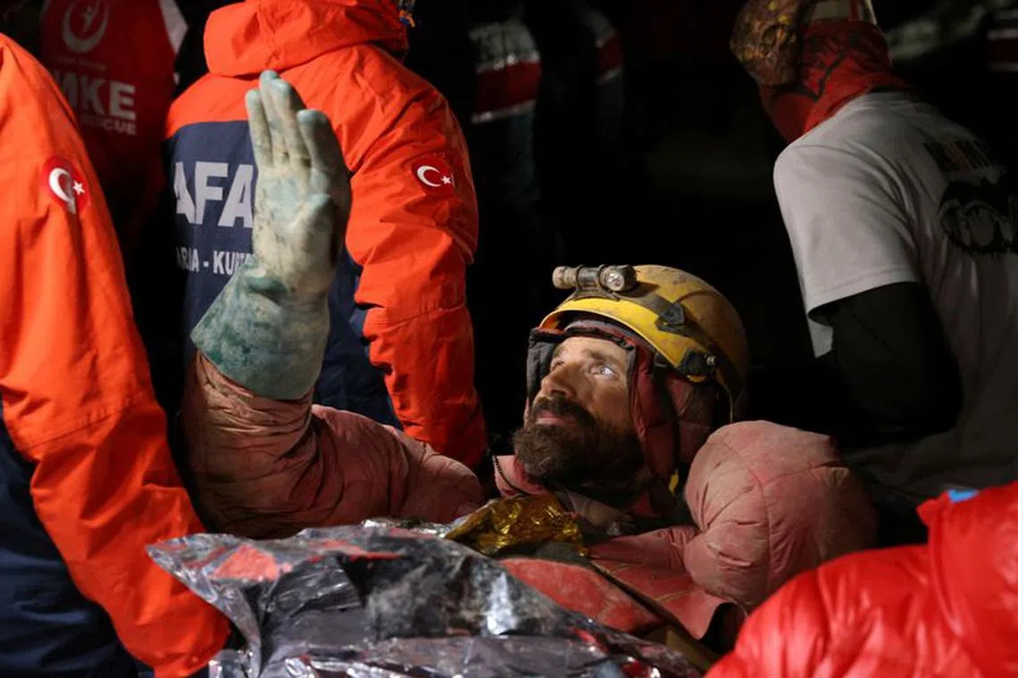 U.S. caver Mark Dickey, on a stretcher, is carried out of the Morca cave as his rescue operation comes to a successful end near Anamur in Mersin province, southern Turkey September 12, 2023. REUTERS/Umit Bektas/File photo