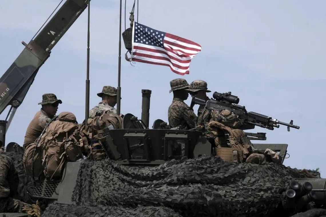 epa12179865 US soldiers participate in the large-scale annual international military exercise 'BALTOPS 25' (Baltic Operations 2025) with an LAV-25 (Light Armored Vehicle) at Ventspils airport, in Ventspils, Latvia, 16 June 2025. The 'BALTOPS 25' exercise takes place from 05 to 20 June in the Baltic Sea region and involves 16 NATO member states, more than 40 ships, 25 aircraft, and approximately 9,000 participants. EPA-EFE/VALDA KALNINA