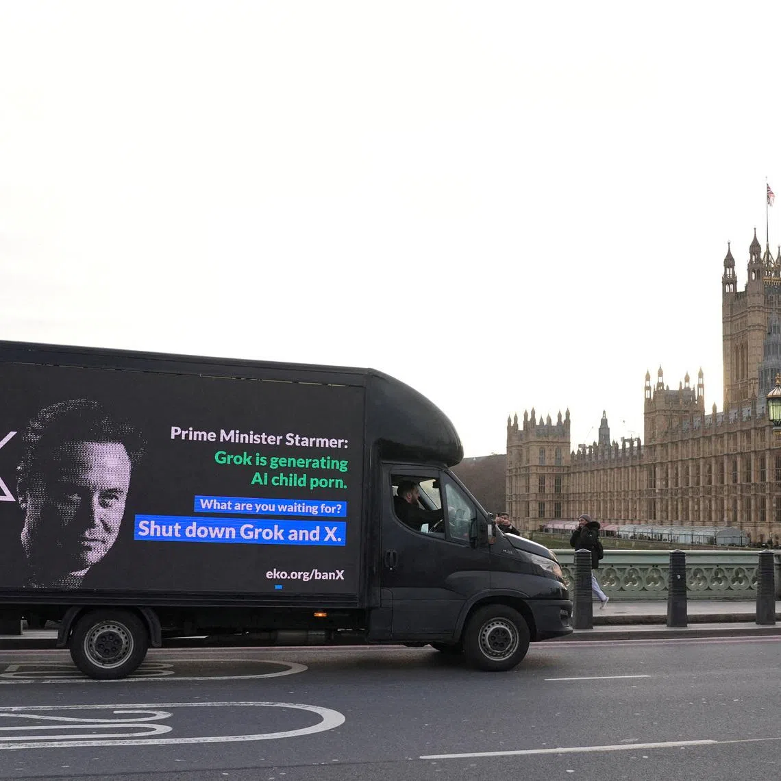 A billboard urging the banning of social media platform X and AI chatbot Grok in London on Jan 14. Britain’s media regulator Ofcom has launched its own separate investigation into X.