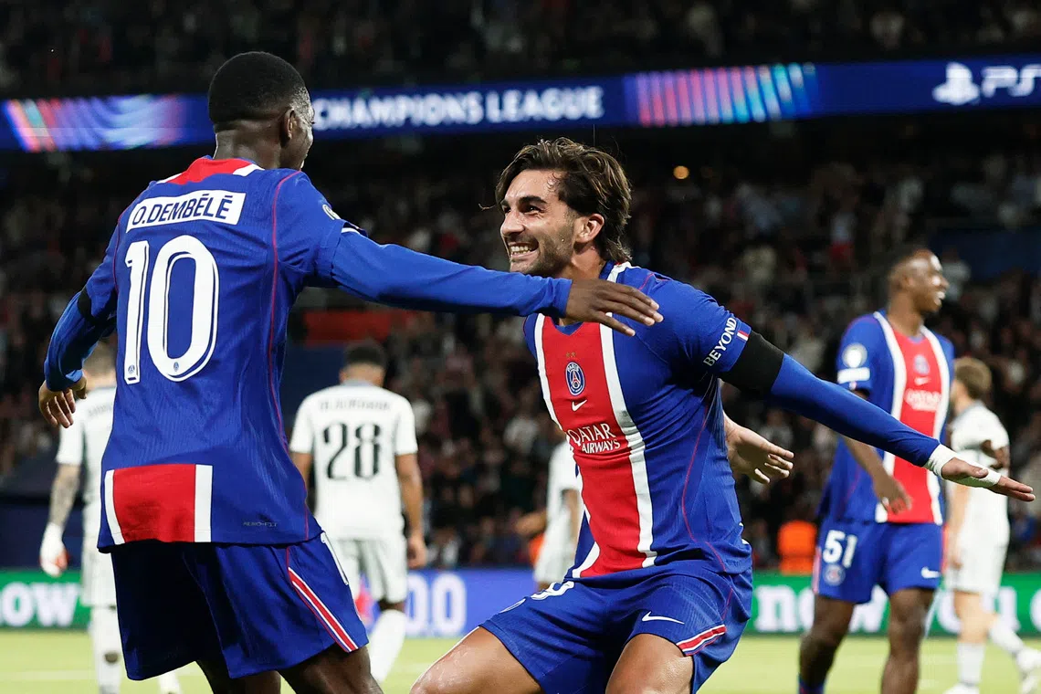 Soccer Football - UEFA Champions League - Paris St Germain v Slovan Bratislava - Parc des Princes, Paris, France - September 9, 2026 Paris St Germain's Ferran Torres celebrates scoring their fifth goal with Ousmane Dembele REUTERS/Benoit Tessier