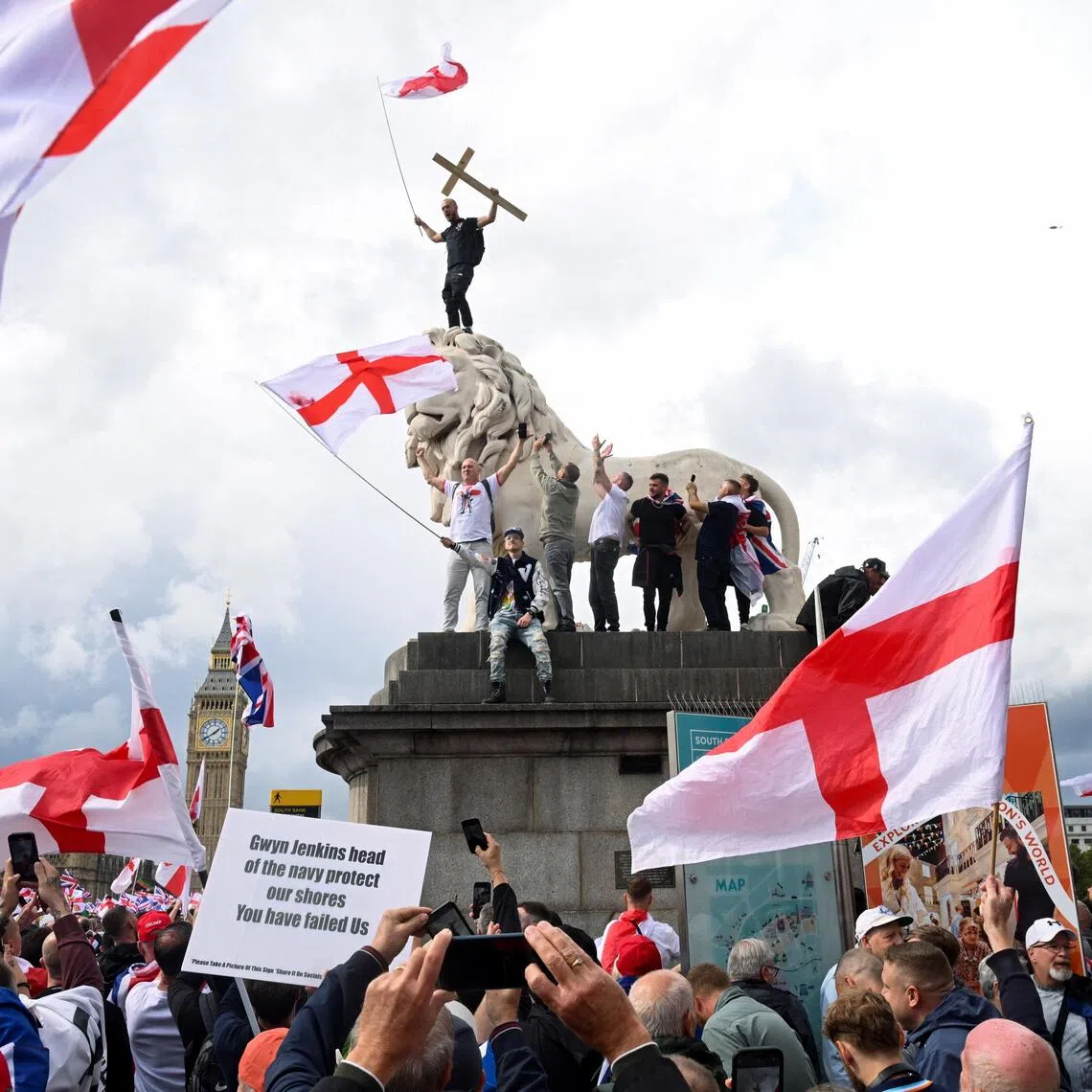 Protesters at a rally organised by British anti-immigration activist Stephen Yaxley-Lennon in London on Sept 13.