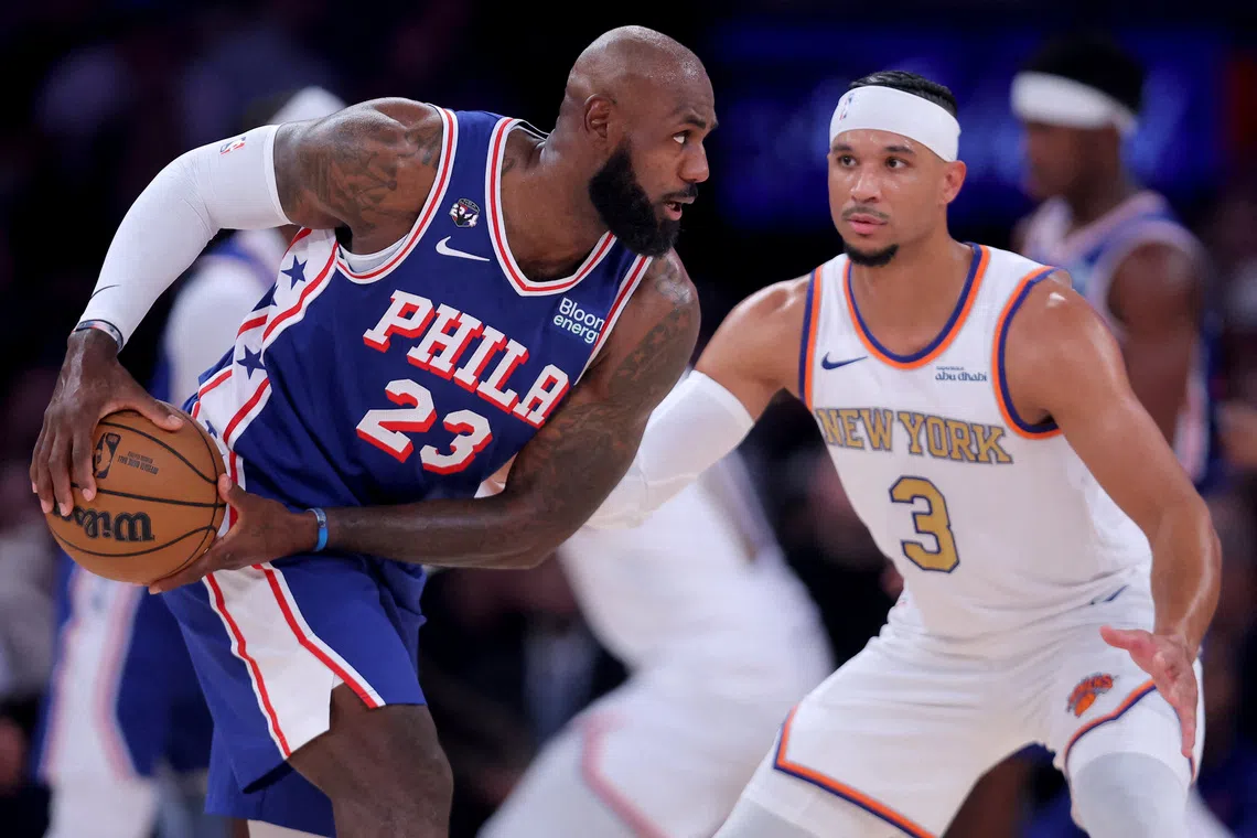 Philadelphia 76ers forward LeBron James controls the ball against New York Knicks guard Josh Hart during the first quarter at Madison Square Garden on Oct 20.