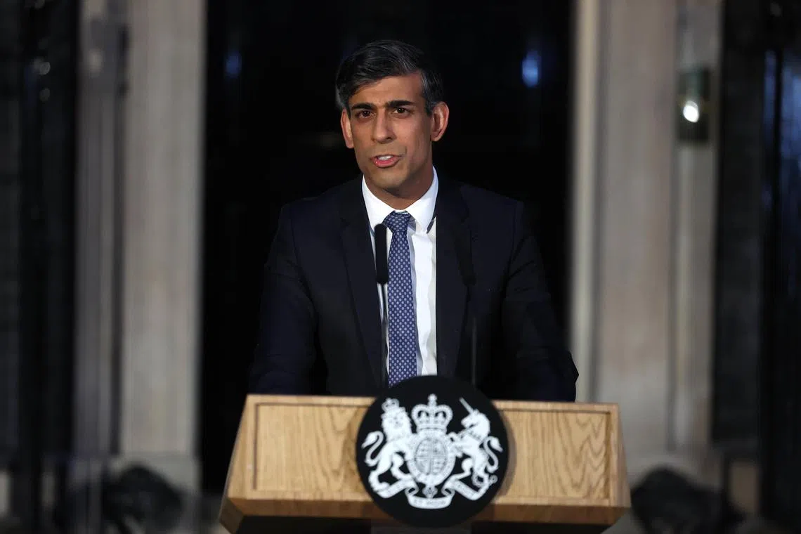 Britain's Prime Minister Rishi Sunak delivers an address from outside his Downing Street home in London.