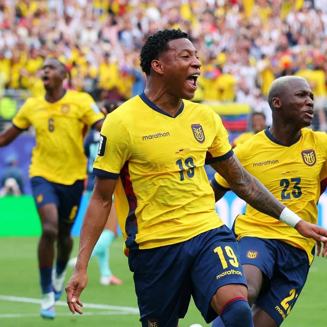Gonzalo Plata celebrates scoring the winning goal for Ecuador against Germany on June 25 with Moises Caicedo.