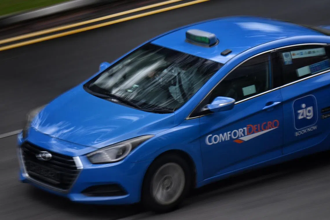 ST20230220_202368590837 Kua Chee Siong/ pixgeneric/ Generic pix of a ComfortDelGro taxi seen travelling along Sims Avenue on Feb 20, 2023.