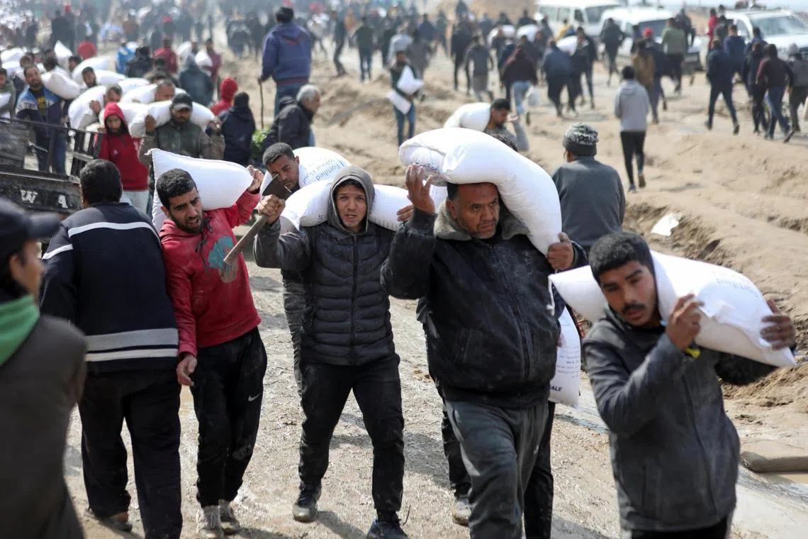 More than 100 people were left dead earlier this week in a frenzied scramble for food from a truck convoy delivering aid, with Israeli forces opening fire on the crowd.