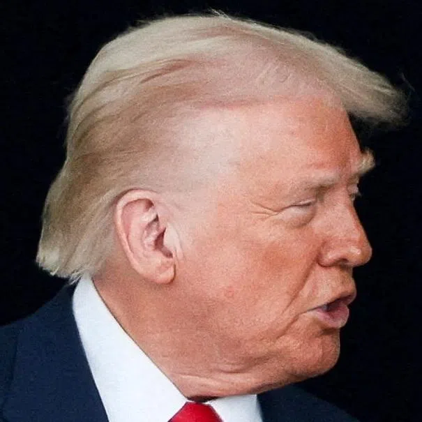 FILE PHOTO: U.S. President Donald Trump and Chinese President Xi Jinping talk as they leave after a bilateral meeting at Gimhae International Airport, on the sidelines of the Asia-Pacific Economic Cooperation (APEC) summit, in Busan, South Korea, October 30, 2025. REUTERS/Evelyn Hockstein/File Photo