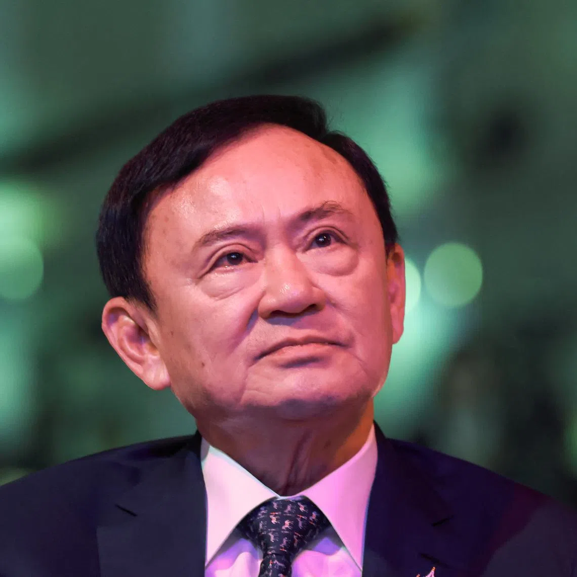 FILE PHOTO: Thailand’s former Prime Minister Thaksin Shinawatra looks on ahead of a panel discussion with Thai broadcaster Nation TV in Bangkok, Thailand, July 9, 2025. REUTERS/Chalinee Thirasupa/ File Photo