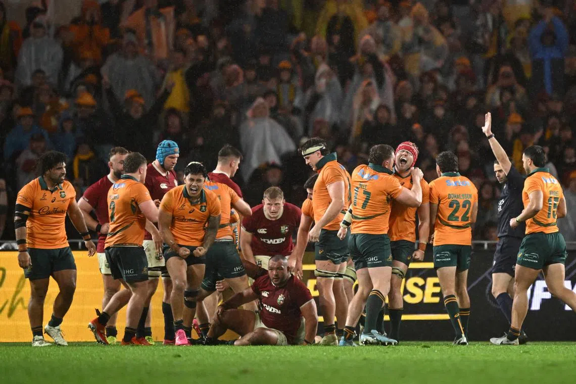 FILE PHOTO: Rugby Union - Australia v British & Irish Lions - Third Test - Accor Stadium, Sydney, Australia - August 2, 2025 Australia celebrate their win over the Lions Dean Lewins/AAP Image via REUTERS/File Photo