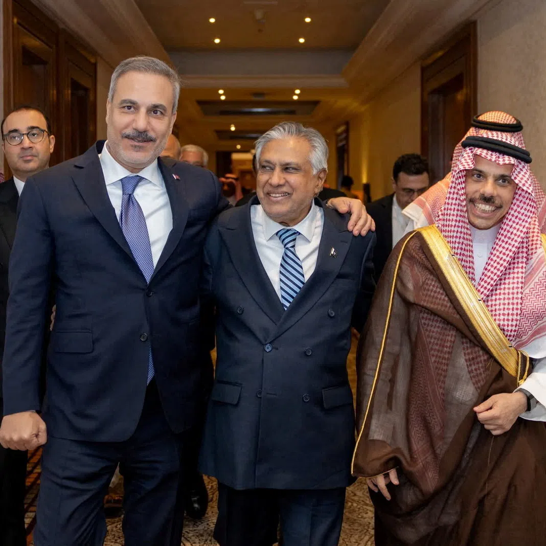 FILE PHOTO: Turkey's Foreign Minister Hakan Fidan, Pakistan's Deputy Prime Minister and Foreign Minister Mohammad Ishaq Dar and Saudi Arabia's Foreign Minister Prince Faisal bin Farhan Al Saud leave after a committee meeting of Mecca defence pact in Riyadh, Saudi Arabia, October 5, 2026. Turkish Foreign Ministry/Handout via REUTERS/File Photo