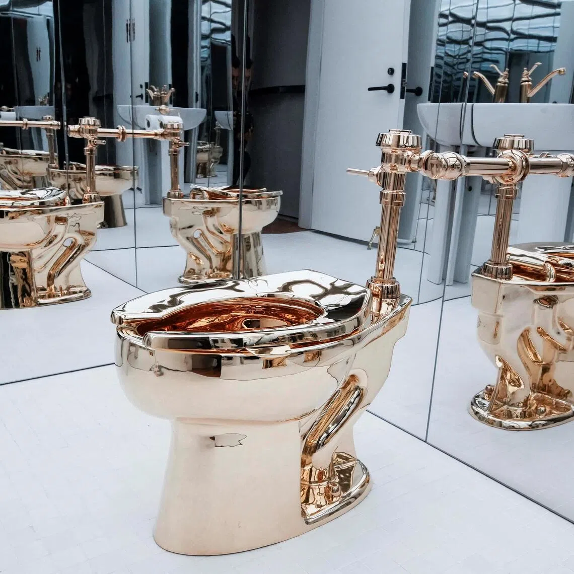 Maurizio Cattelan's America is a fully functional toilet fashioned from just over 100kg of solid 18-karat gold.
