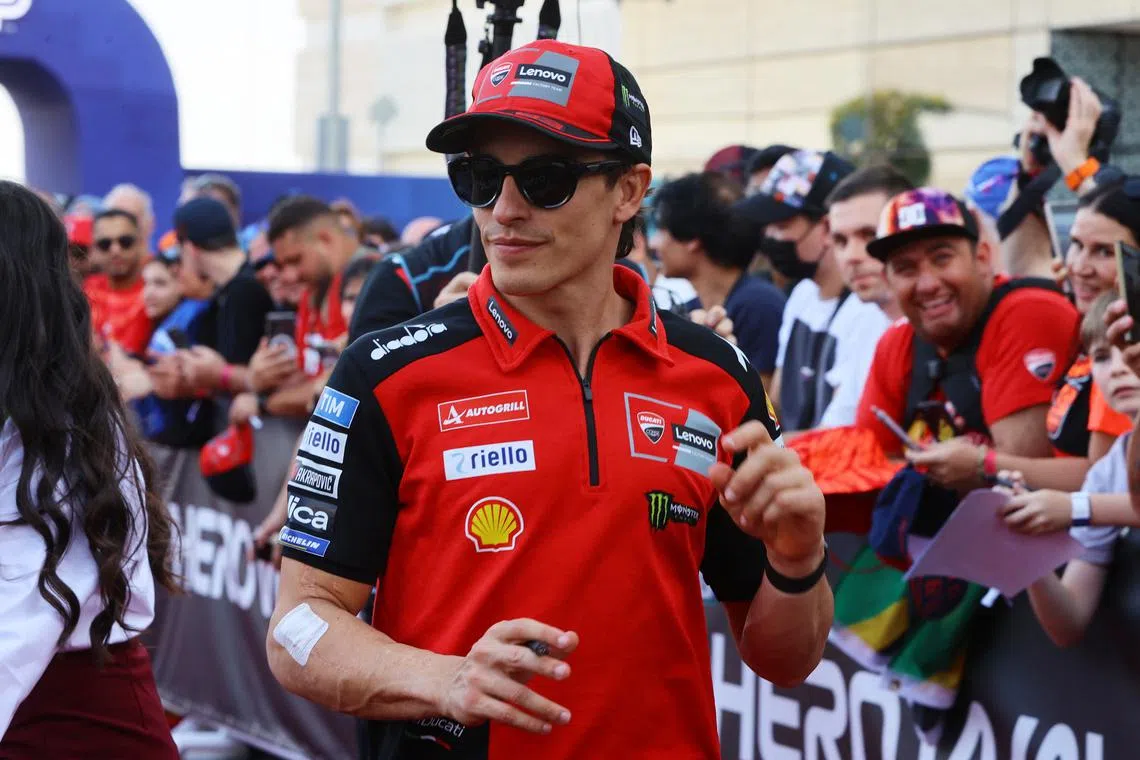 FILE PHOTO: MotoGP - Qatar Grand Prix - Lusail International Circuit, Doha, Qatar - April 13, 2025 Ducati Lenovo Team's Marc Marquez arrives ahead of the Qatar Grand Prix REUTERS/Ibraheem Al Omari/File Photo