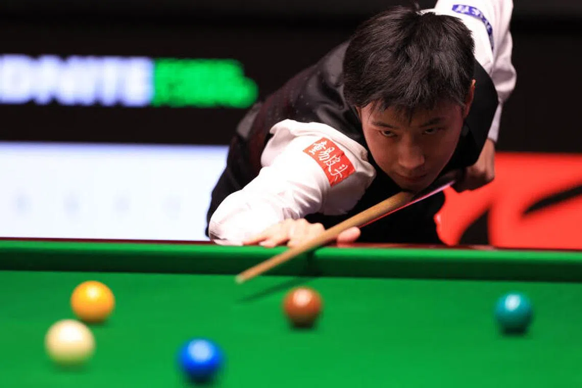 Snooker - World Snooker Championship - The Crucible Theatre, Sheffield, Britain - May 4, 2025 China's Xintong Zhao in action during his final match against Wales' Mark Williams Action Images via Reuters/Andrew Boyers