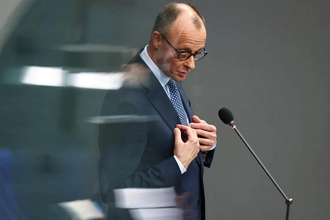 German Chancellor Friedrich Merz answers questions from lawmakers during a plenum session of the lower house of parliament, the Bundestag, in Berlin, Germany March 25, 2026.  REUTERS/Liesa Johannssen