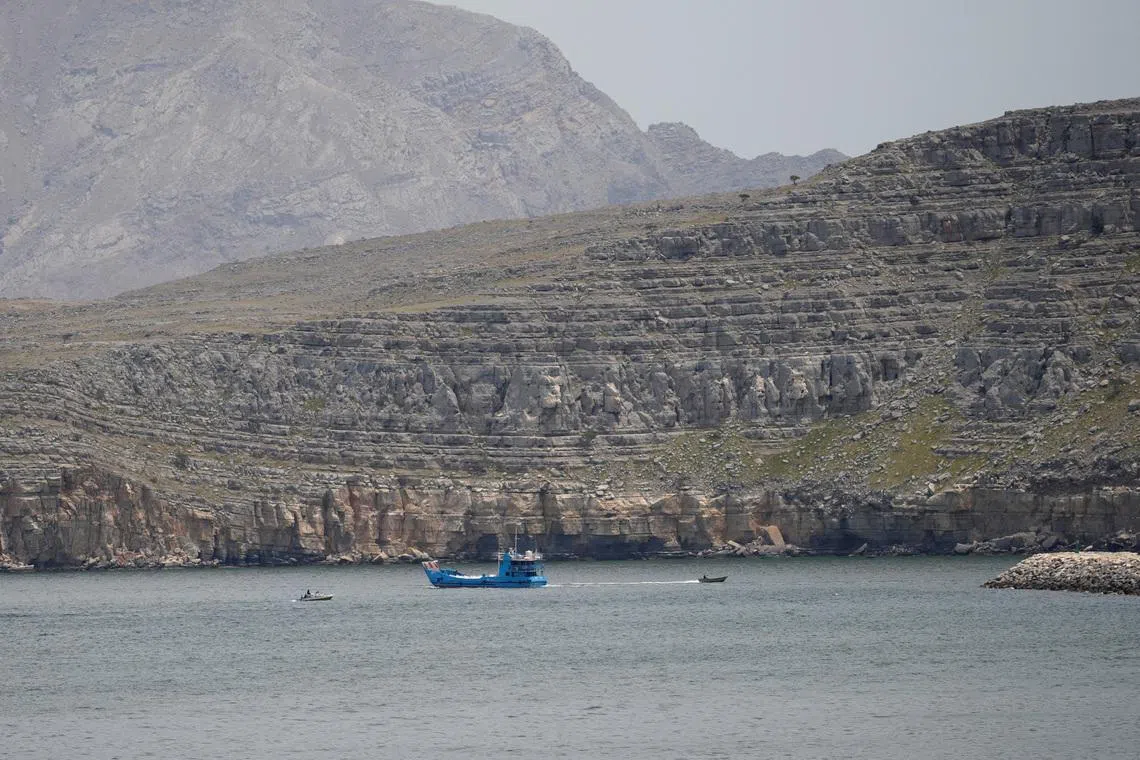 Ships and boats in the Strait of Hormuz, Musandam, Oman, April 22, 2026. REUTERS/Stringer