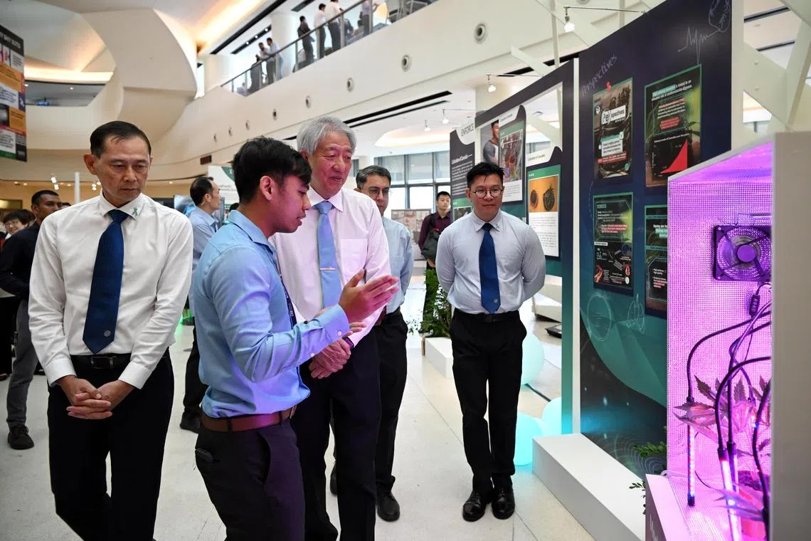 ST20230503_202368653323 Kua Chee Siong/ nccnb03/ 
Note: Embargoed till 4pm on May 3, 2023.
Mr Teo Chee Hean, Senior Minister and Coordinating Minister for National Security, (centre) being introduced to a mockup of household cannabis cultivation by Muhammad Fazri, 33, an investigation officer with CNB, during the Central Narcotics Bureau (CNB) Workplan Seminar at the Singapore University of Technology and Design (SUTD) Auditorium on May 3, 2023. With him are Dr Muhammad Faishal bin Ibrahim, Minister of State for Home Affairs and Minister of State for National Development, Security, (2nd from right- hidden) and Mr Sam Tee, Director CNB (left). 
On display is an exhibition highlighting CNB’s enforcement, education and engagement efforts for a drug-free Singapore.