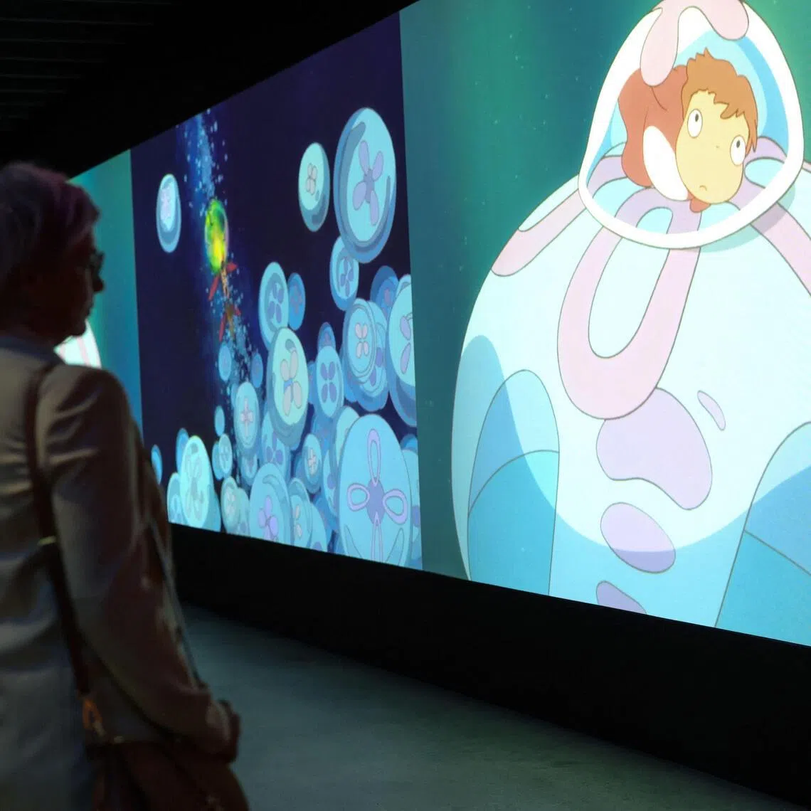 A visitor watches a video shown at the Academy Museum Studio Ghibli's Ponyo media preview in Los Angeles on Feb 12.