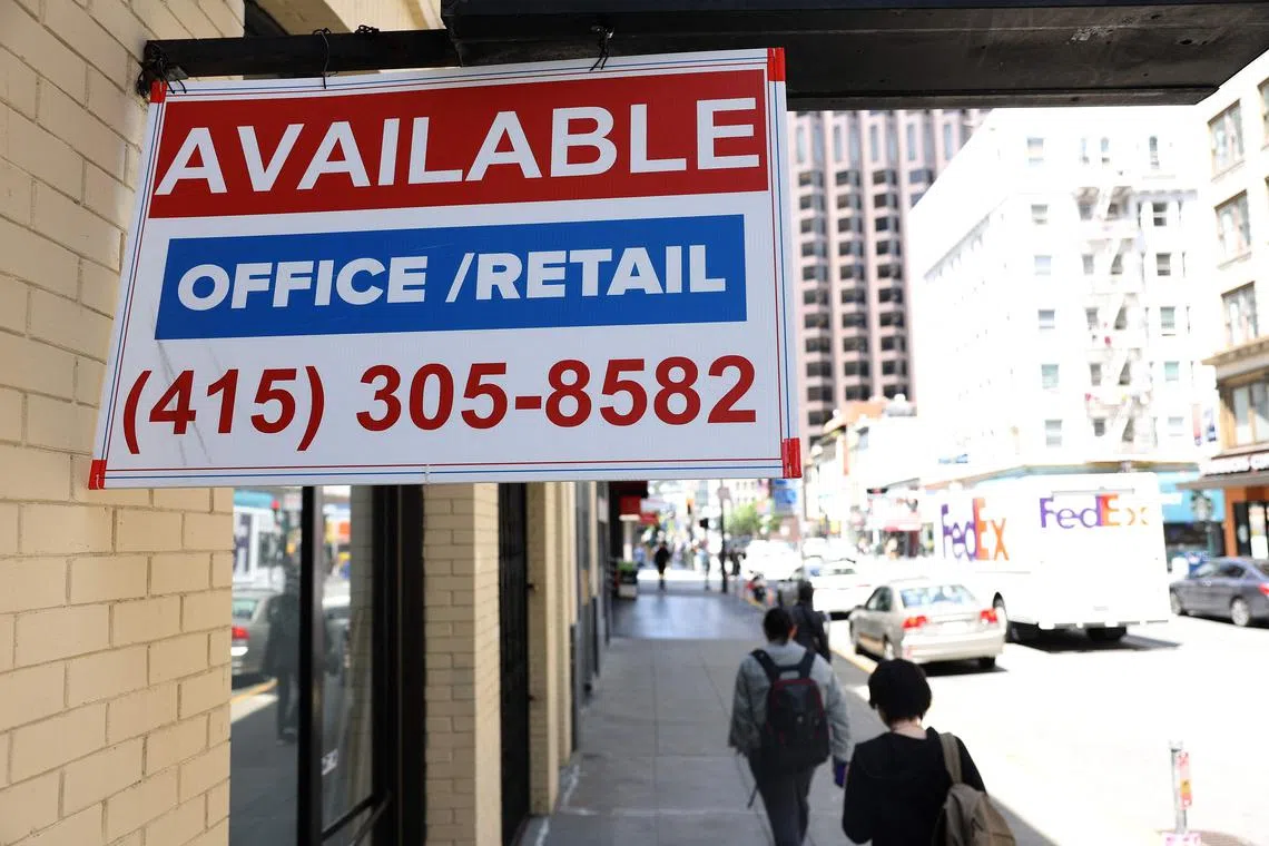 SAN FRANCISCO, CALIFORNIA - MAY 09: Pedestrians walk by an empty retail space on May 09, 2023 in San Francisco, California. San Francisco's downtown has an estimated 18.4 million square feet of available real estate and continues to struggle with keeping retail and commercial properties rented out following the COVID-19 pandemic and lags behind all major cities in the U.S. and Canada. (Photo by JUSTIN SULLIVAN / GETTY IMAGES NORTH AMERICA / Getty Images via AFP)