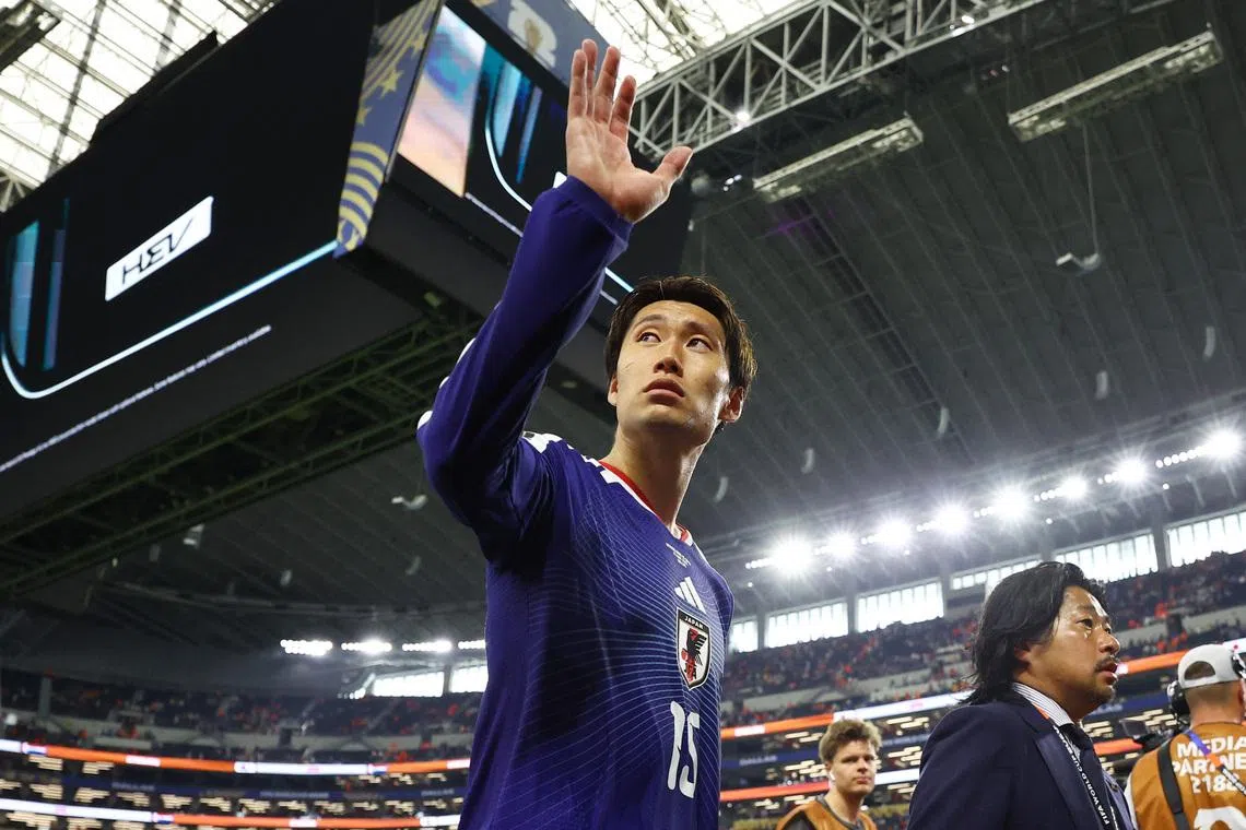 Soccer Football - FIFA World Cup 2026 - Group F - Netherlands v Japan - Dallas Stadium, Arlington, Texas, U.S. - June 14, 2026 Japan's Daichi Kamada salutes their fans as he leaves the pitch after the match REUTERS/Hannah Mckay