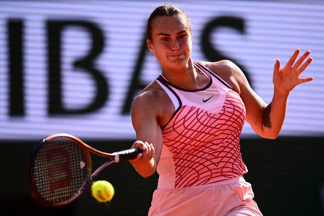 Belarus' Aryna Sabalenka plays a forehand return to Czech Republic's Karolina Muchova during their women's singles semi-final match on day twelve of the Roland-Garros Open tennis tournament at the Court Philippe-Chatrier in Paris on June 8, 2023. (Photo by Emmanuel DUNAND / AFP)