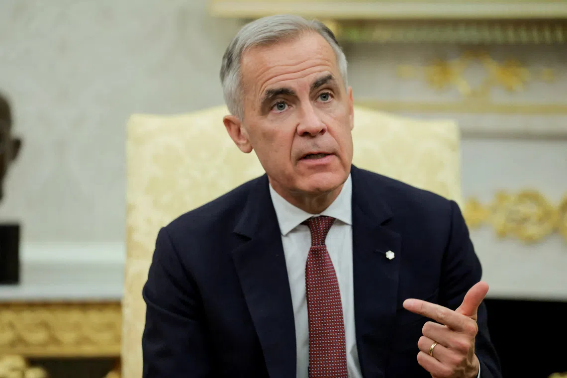 Canada's Prime Minister Mark Carney speaks as he and U.S. President Donald Trump (not pictured) meet in the Oval Office at the White House in Washington, D.C., U.S., October 7, 2025. REUTERS/Evelyn Hockstein