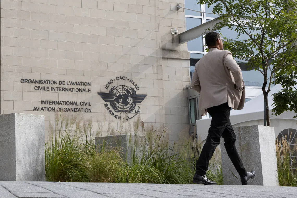 FILE PHOTO: Members of the International Civil Aviation Organization (ICAO) agency arrive at ICAO headquarters in Montreal, Quebec, Canada October 1, 2022.  REUTERS/Christinne Muschi/File Photo