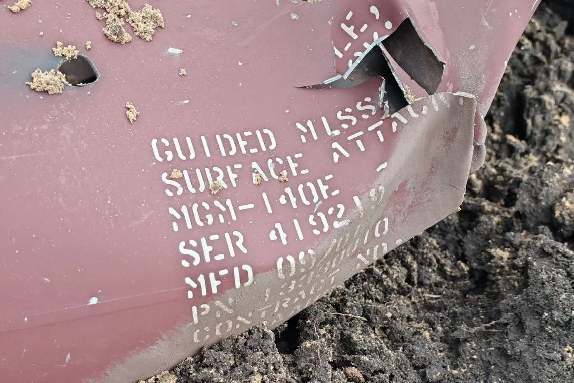 A fragment of U.S.-made ATACMS missiles, which was intercepted, according to Russia's Defence Ministry, lies in a forest in an unidentified location in Voronezh region, Russia, in this image released on November 19, 2025.  Russian Defence Ministry/Handout via REUTERS