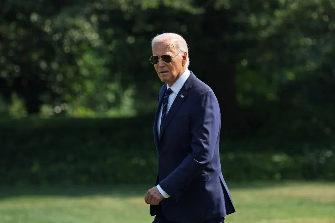 FILE PHOTO: U.S. President Joe Biden walks across the South Lawn to board Marine One for travel to Nevada from the White House in Washington, U.S., July 15, 2024. REUTERS/Leah Millis/FilePhoto