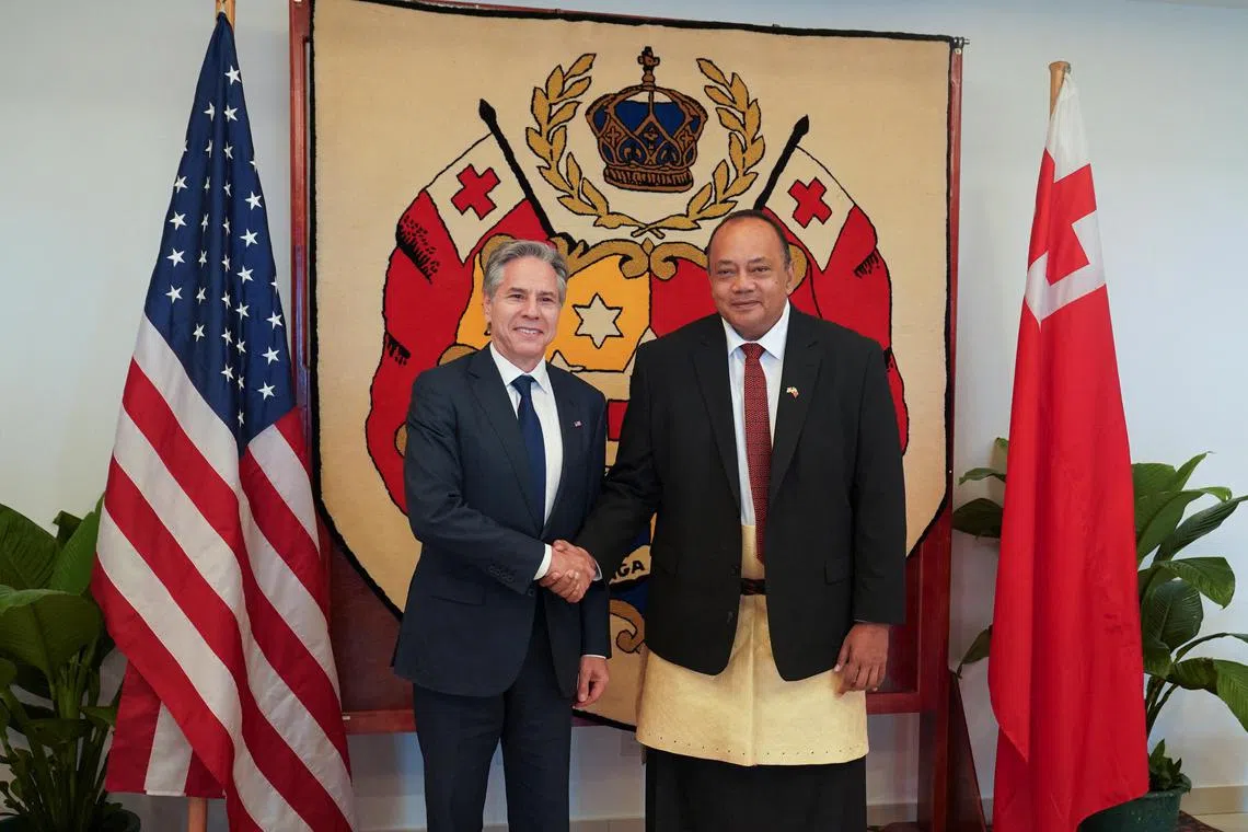 US Secretary of State Antony Blinken (left) meets Tonga's Prime Minister Siaosi Sovaleni in Nuku'alofa, Tonga, on July 26.