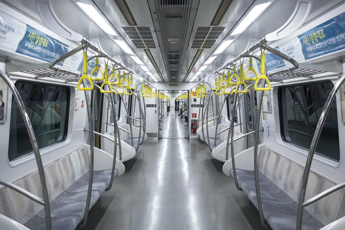 The accused woman was charged with injuring two women in her 60s and a man in his 50s inside a train.