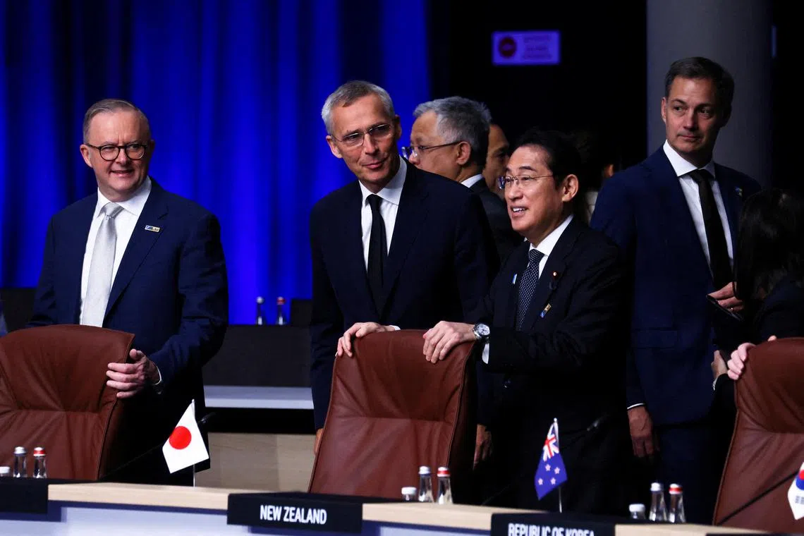 Nato Secretary-General Jens Stoltenberg (centre left) and Japanese Prime Minister Fumio Kishida (centre right) at the Nato summit in Lithuania.