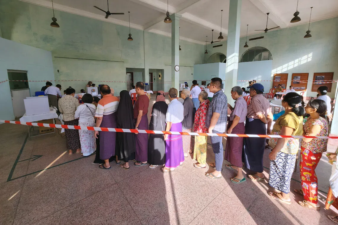 Soldiers with guns, short lines of voters: Myanmar goes to the polls for first time since 2021 coup