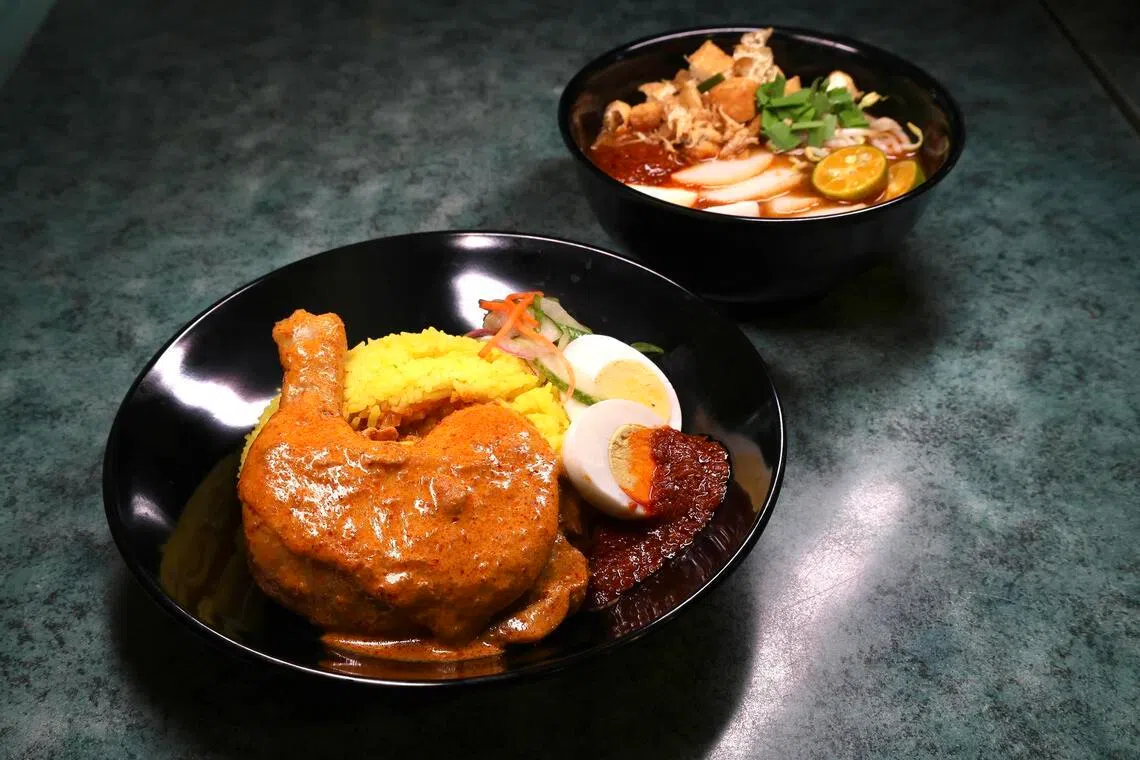 Nasi Kunyit (left) and Mee Siam (right) at Nya Nya.