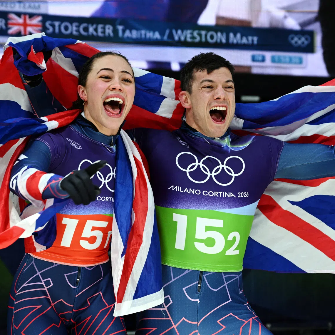 FILE PHOTO: Milano Cortina 2026 Olympics - Skeleton - Mixed Team - Cortina Sliding Centre, Cortina d'Ampezzo, Italy - February 15, 2026. Tabitha Stoecker of Britain and Matt Weston of Britain celebrate after winning the gold medal in the Skeleton Mixed Team. REUTERS/Annegret Hilse/File Photo