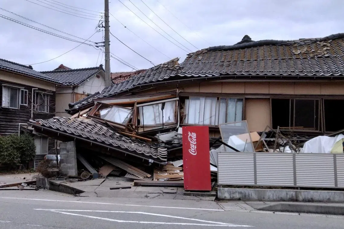 A collapsed house following an earthquake is seen in Wajima, Ishikawa prefecture, Japan, on Jan 1, 2024.