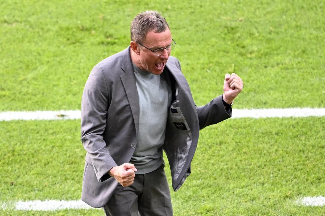 Soccer Football - Euro 2024 - Group D - Poland v Austria - Berlin Olympiastadion, Berlin, Germany - June 21, 2024 Austria coach Ralf Rangnick celebrates after the match REUTERS/Fabian Bimmer