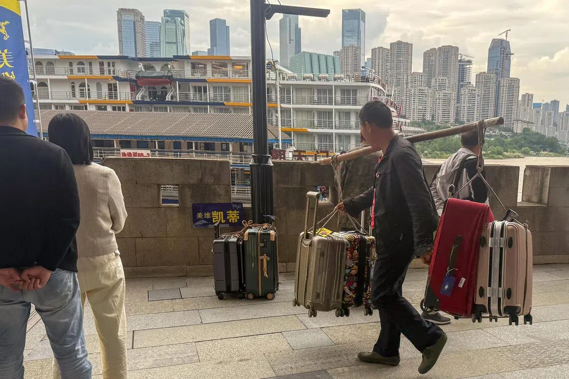 Once a common sight in the city, porters have been increasingly phased out by delivery riders and improvements to Chongqing’s transport system.