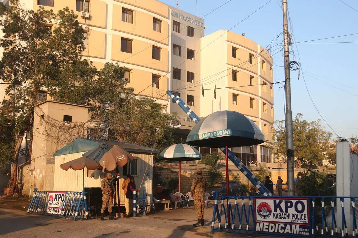 Four people were killed on Friday when a suicide squad stormed a police compound in Karachi.