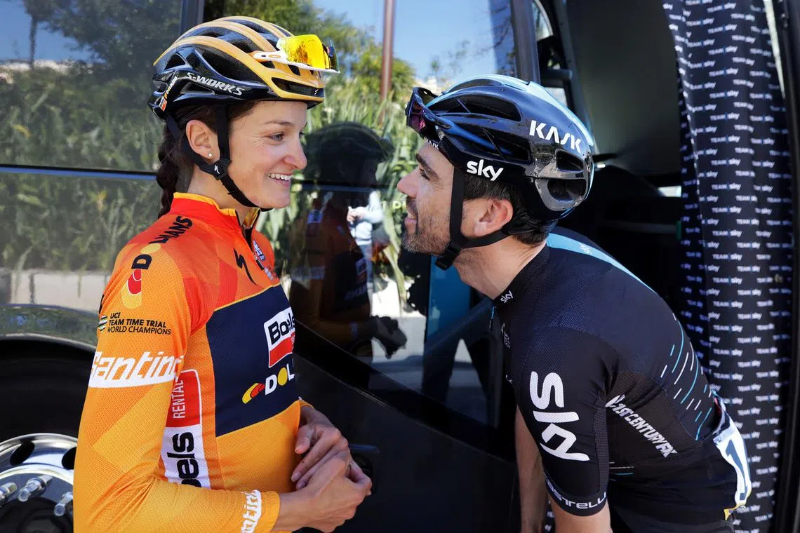 FILE PHOTO: British cyclist Lizzie Armitstead-Deignan talks with her husband Sky rider Philip Deignan before the start of the 7th stage of Paris Nice cycling race, in Nice, France March 11, 2017.              REUTERS/Eric Gaillard/File Photo