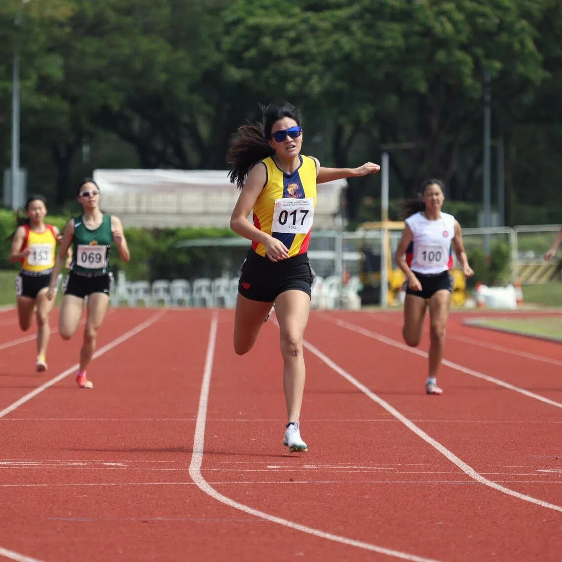 Alexis Teo crossing the finishing line, winning the National School Games A Division 400m sprint on April 8, 2026.