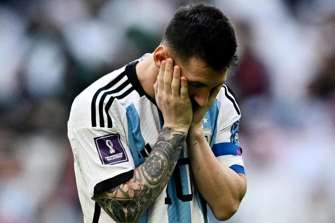 Lionel Messi converted a first-half penalty against Saudi Arabia to become only the fifth player to score at four World Cups, but had to suffer the ignominy of defeat.