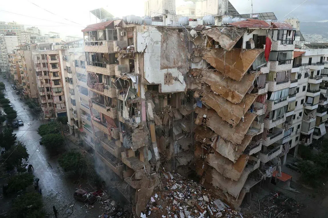 A damaged building at the site of overnight Israeli airstrikes that targeted Tayouneh area on Beirut’s suburbs outskirts on Nov 25, 2024. 