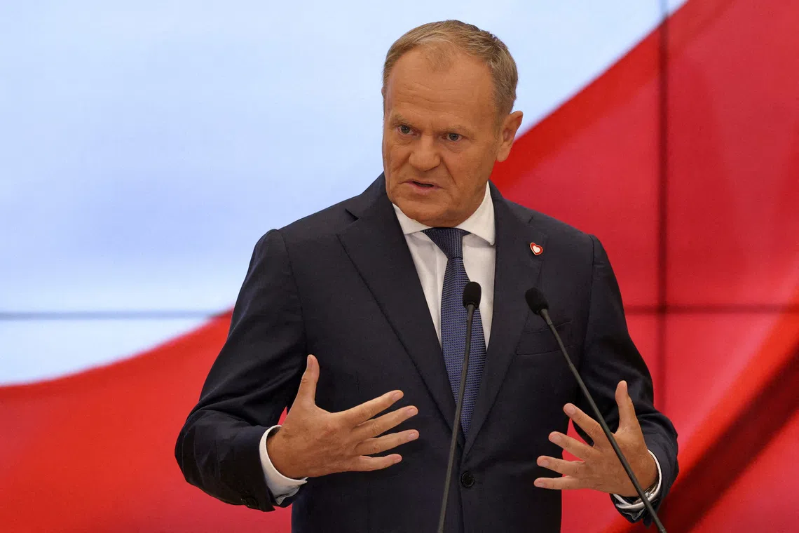 FILE PHOTO: Polish Prime Minister Donald Tusk speaks during a press conference  in Warsaw, Poland, July 23, 2025. REUTERS/Kuba Stezycki/File Photo