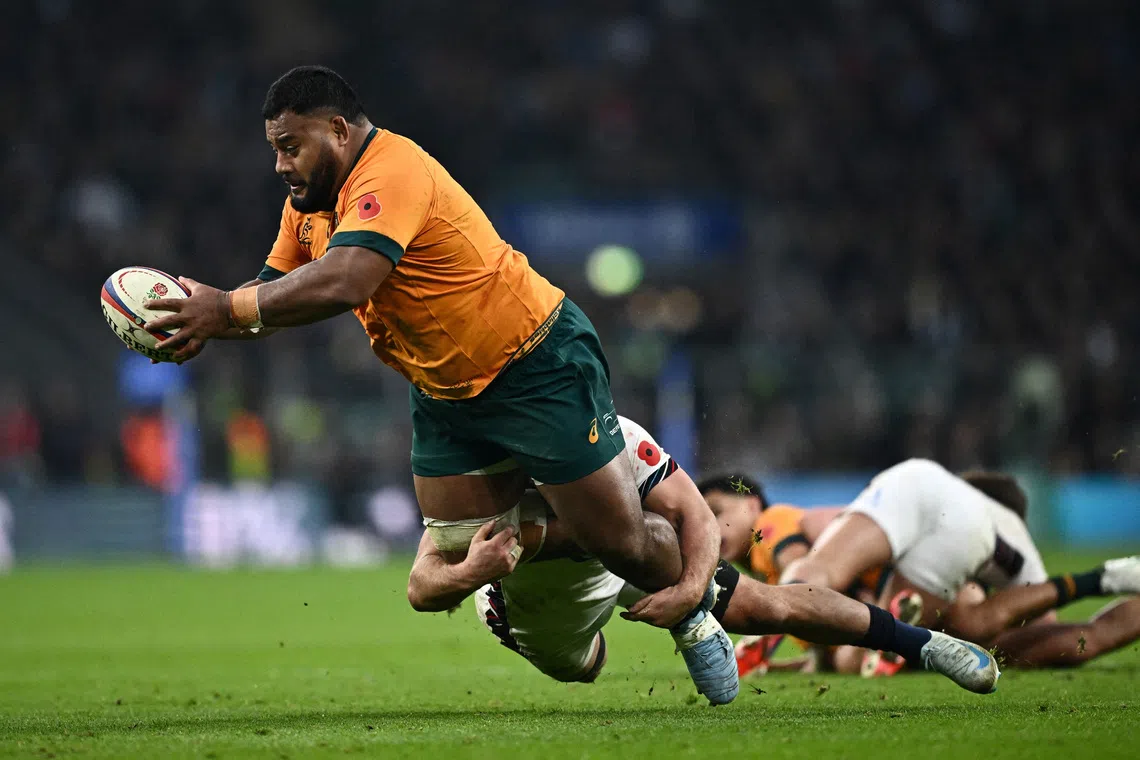 FILE PHOTO: Rugby Union - Autumn Internationals - England v Australia - Allianz Stadium Twickenham, London, Britain - November 9, 2024 Australia's Taniela Tupou in action REUTERS/Dylan Martinez/File Photo