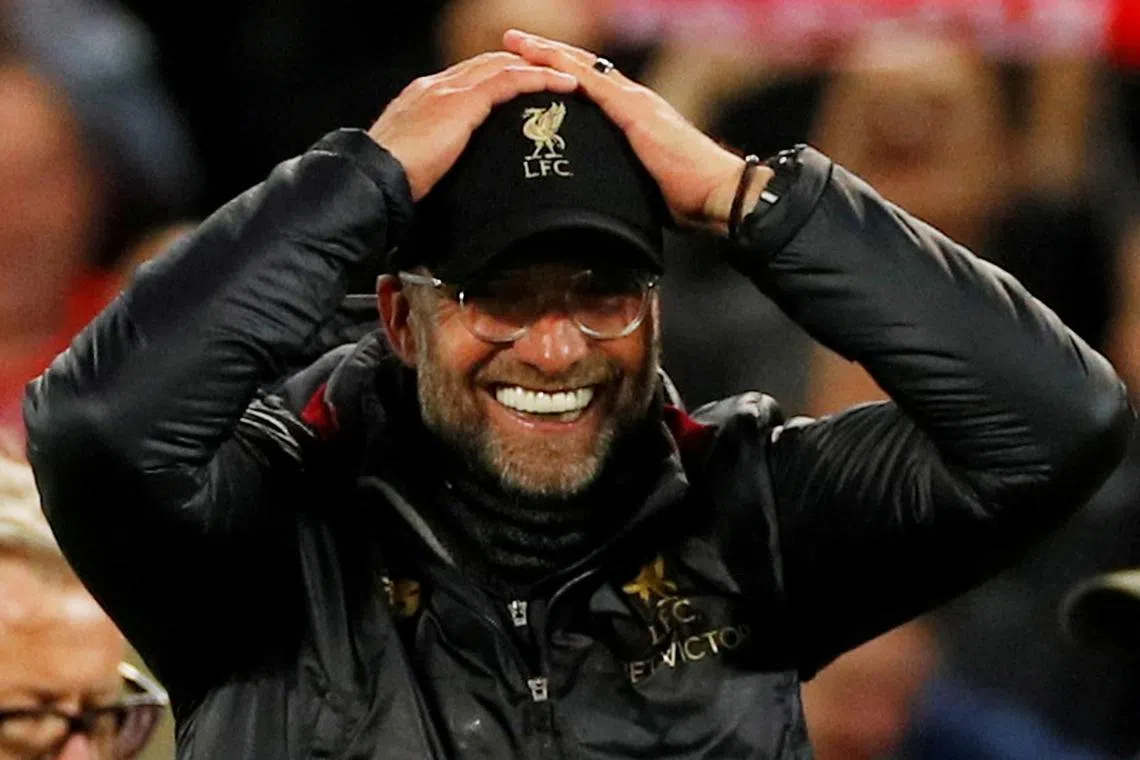 FILE PHOTO: Soccer Football - Champions League Semi Final Second Leg - Liverpool v FC Barcelona - Anfield, Liverpool, Britain - May 7, 2019  Liverpool manager Juergen Klopp celebrates after the match   REUTERS/Phil Noble/File Photo
