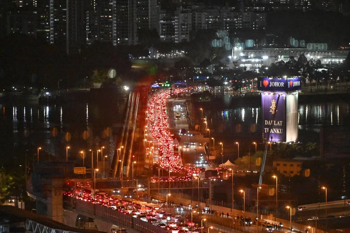 Traffic jam on the causeway heading from Johor Bahru to Singapore due to enhanced security measures at the Woodlands checkpoint on May 19, 2024.
