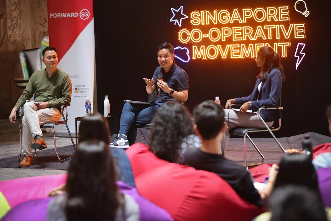 Minister of State for Culture, Community and Youth Alvin Tan speaking at a panel discussion on how the co-operative model can empower communities.